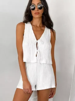 Ensemble deux pièces blanc décontracté haut sans manches à col V et pantalon élégant