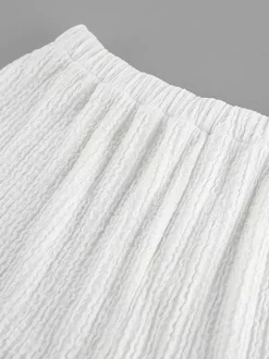 Ensemble deux pièces blanc décontracté haut sans manches à col V et pantalon élégant