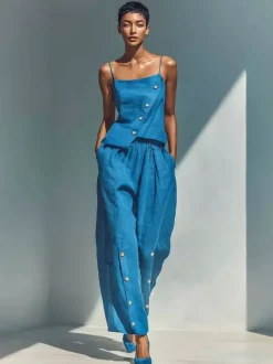 Ensemble deux pièces bleu ciel streetwear en lin boutons bretelles asymétriques col sans manches pantalon décontracté