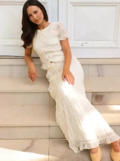 Ensemble deux pièces composé d'un crop top à manches bouffantes et froncées et d'une jupe longue sirène.