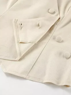 Ensemble deux pièces d'été pour femme haut asymétrique et pantalon droit 2026