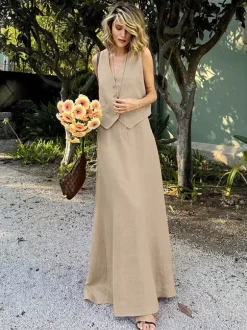 Ensemble deux pièces jupe et haut orange à boutons rétro style resort en lin col V sans manches.