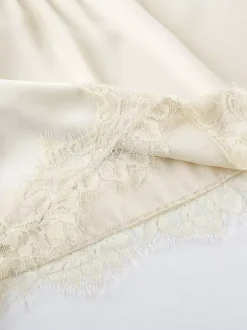 Ensemble deux pièces jupe sans manches en dentelle abricot chic pour un look décontracté au quotidien