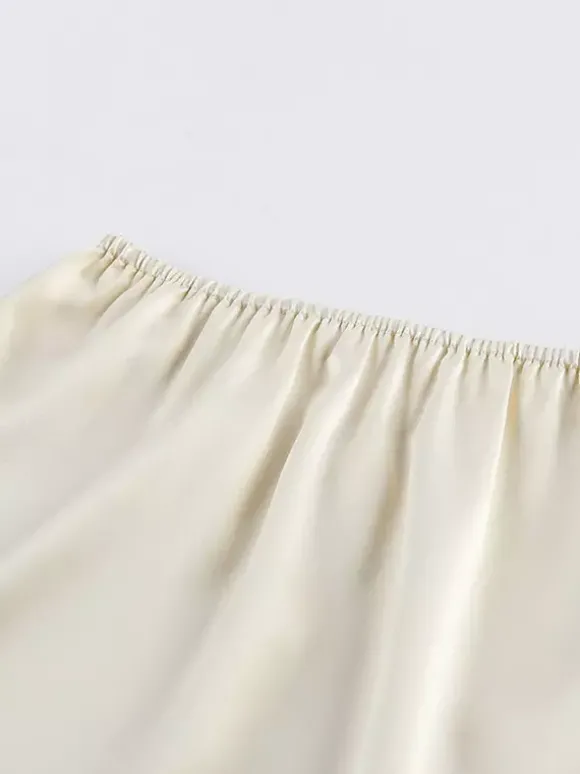 Ensemble deux pièces jupe sans manches en dentelle abricot chic pour un look décontracté au quotidien