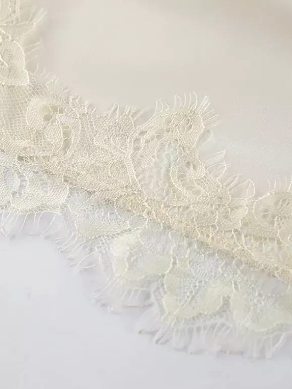 Ensemble deux pièces jupe sans manches en dentelle abricot chic pour un look décontracté au quotidien