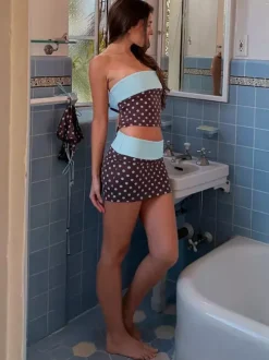 Ensemble deux pièces jupe sans manches à pois bleus style décontracté en polyester.