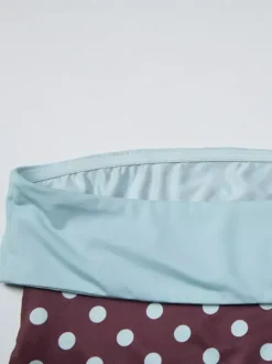 Ensemble deux pièces jupe sans manches à pois bleus style décontracté en polyester.