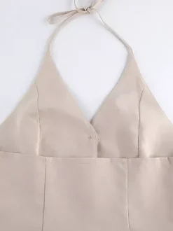 Ensemble deux pièces kaki chic pour tous les jours : pantalon sans manches à col V et haut à manches longues.