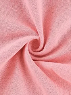 Ensemble deux pièces : pantalon rose chic à ceinture haut en coton à manches longues et col rabattu.
