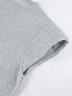 Ensemble lounge gris chiné : haut oversize à manches courtes et taille élastique pantalon large.