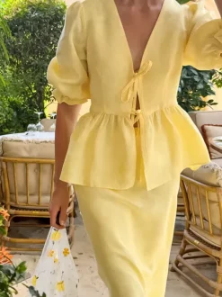 Ensemble 2 pièces pour femme : haut péplum à col en V et manches bouffantes noué sur le devant jupe longue sirène