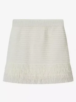 Ensemble 2 pièces pour femme : jupe blanche élégante à franges et revers manches longues.