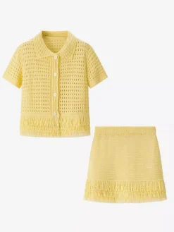 Ensemble 2 pièces pour femme : jupe blanche élégante à franges et revers manches longues.