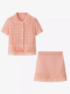 Ensemble 2 pièces pour femme : jupe blanche élégante à franges et revers manches longues.