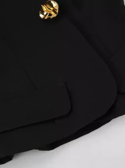 Ensemble tailleur-pantalon deux pièces blazer à manches bouffantes et pantalon large pour femme.