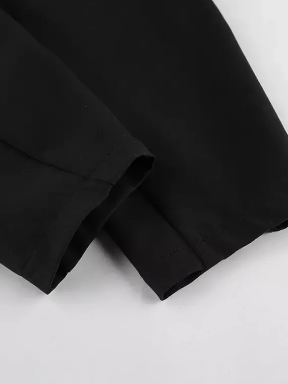 Ensemble tailleur-pantalon deux pièces blazer à manches bouffantes et pantalon large pour femme.