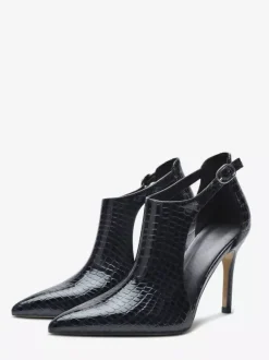 Escarpins noirs à talons hauts motif serpent bout pointu découpe et bride cheville.