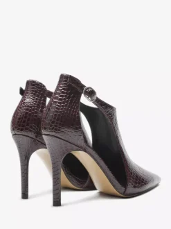 Escarpins noirs à talons hauts motif serpent bout pointu découpe et bride cheville.