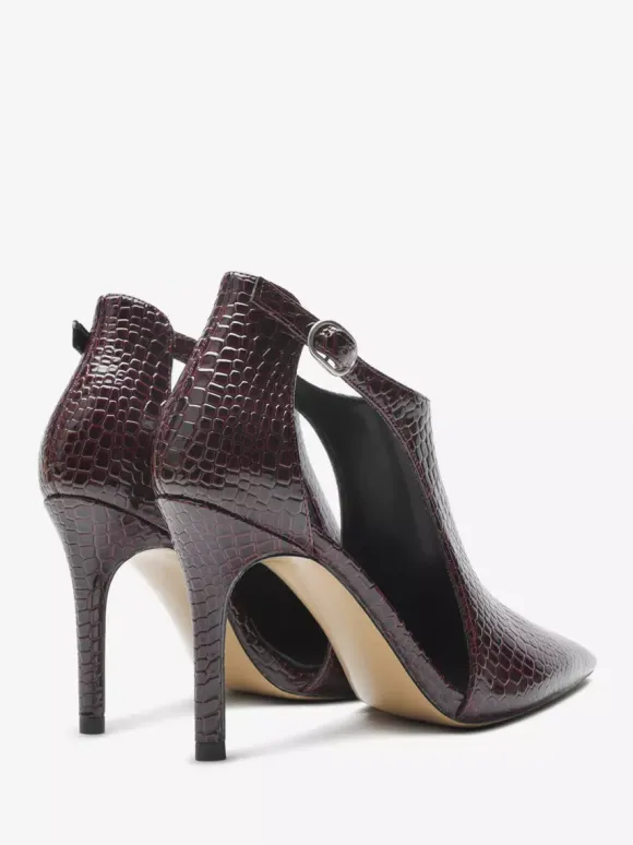 Escarpins noirs à talons hauts motif serpent bout pointu découpe et bride cheville.