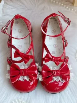 Escarpins Lolita à brides cheville et n艙uds en cuir PU à talon compensé.