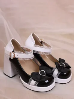 Escarpins Lolita à talons compensés en cuir verni ornés de n艙uds en dentelle rose