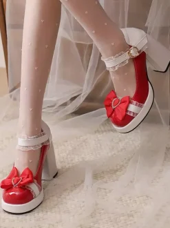 Escarpins Lolita à talons compensés en cuir verni ornés de n艙uds en dentelle rose