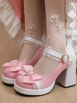 Escarpins Lolita à talons compensés en cuir verni ornés de n艙uds en dentelle rose