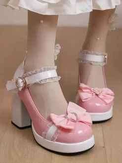 Escarpins Lolita à talons compensés en cuir verni ornés de n艙uds en dentelle rose