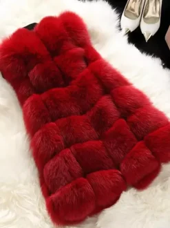 Gilet en fausse fourrure veste mi-longue d'hiver écologique sans manches pour femme 2026