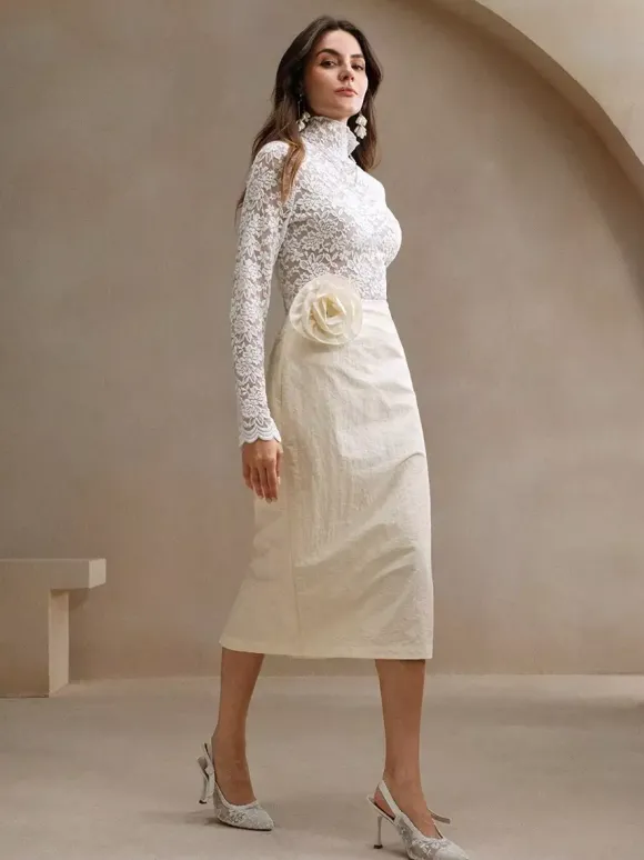 Haut à col montant en dentelle florale manches longues coupe ajustée et transparente pour femme 2026