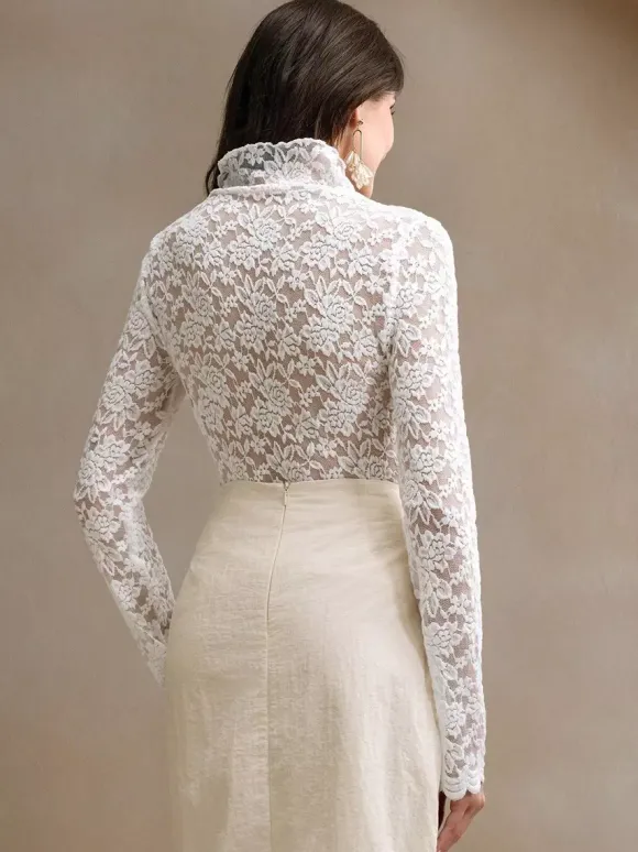 Haut à col montant en dentelle florale manches longues coupe ajustée et transparente pour femme 2026