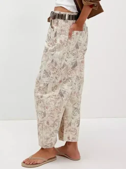Jean à imprimé chat pour femme - Pantalon en denim beige neutre style rétro à jambes larges en forme de fer à cheval - Collection printemps-été 2026