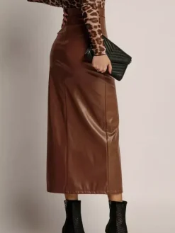 Jupe en similicuir avec fente latérale taille haute couleur unie jupe mi-longue chic en PU pour femme 2026