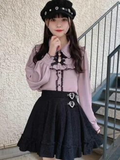 Jupe gothique lolita jupes lolita à volants et 艙illets noirs