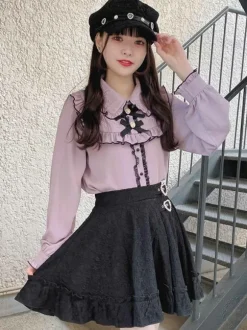 Jupe gothique lolita jupes lolita à volants et 艙illets noirs