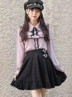 Jupe gothique lolita jupes lolita à volants et 艙illets noirs