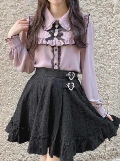 Jupe gothique lolita jupes lolita à volants et 艙illets noirs