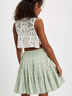 Jupes blanches plissées taille naturelle chic pour femmes