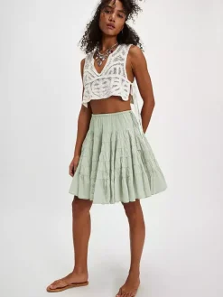 Jupes blanches plissées taille naturelle chic pour femmes