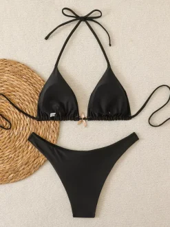 Maillot de bain bikini noir à lacets pour femme idéal pour l'été à la plage.