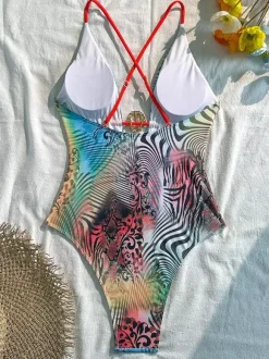 Maillot de bain une pièce monokini à imprimé zèbre et léopard dos croisé et bretelles croisées.