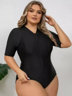 Maillot de bain anti-UV noir uni grande taille à manches mi-longues et fermeture éclair sur le devant