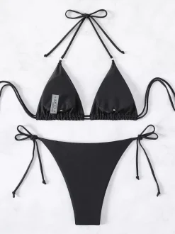 Maillot de bain bikini noir à lacets pour femme idéal pour l'été à la plage.