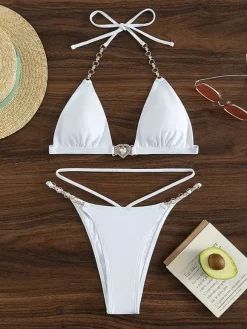 Maillot de bain bikini noir à lacets pour femme idéal pour l'été à la plage.