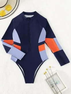 Maillot de bain une pièce de surf à manches longues et fermeture éclair sur le devant empiècements colorés