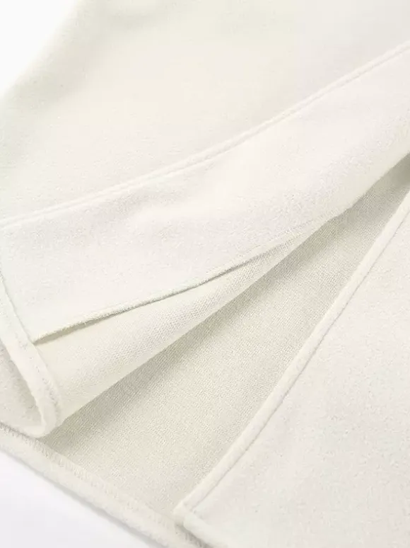 Manteau court femme à col montant - Veste crème coupe oversize - Tenues décontractées et minimalistes pour le printemps 2026