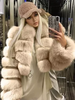 Manteau en fausse fourrure pelucheuse à col rabattu pour femme veste courte d'hiver 2026