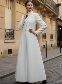 Manteau long en laine blanche à col montant et coupe trapèze pour femme 2026