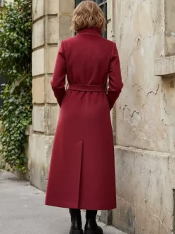 Manteau long en laine ceinturé à double boutonnage et col montant pour femme 2026