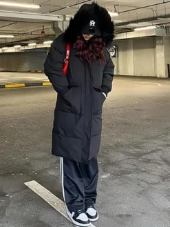 Manteau Matelassé Long Femme Comme Doudoune à Capuche avec Manches Longues à Zip avec Poches Unicolore Manteau Femme